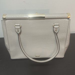 NWOT. Kate Spade with dust bag. Light taupe (looks more gray) Croc